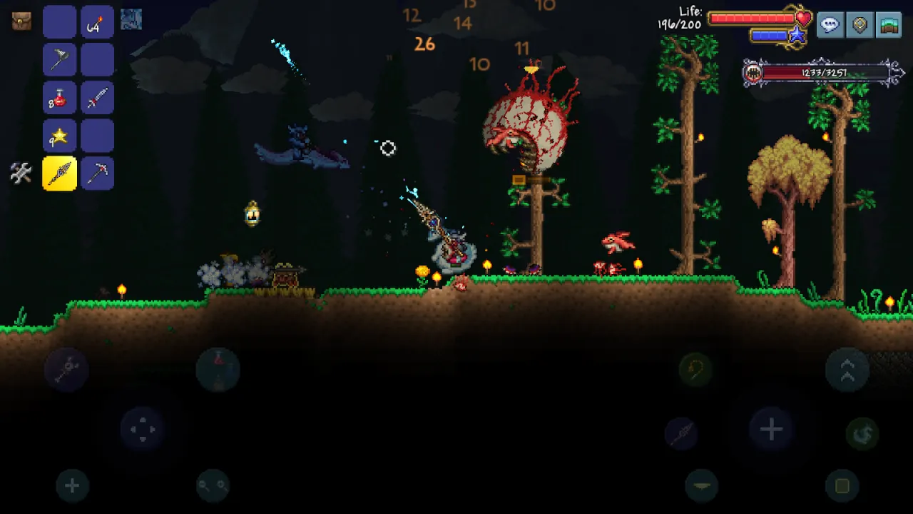 Captura de ecrã oficial de Terraria Mobile durante um confronto com um chefe